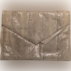 Stunning mint condition vintage snakeskin clutch.